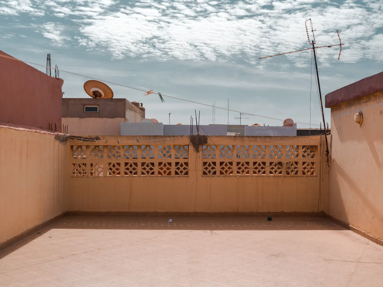 Rooftop terrace with satellite dishes and antennas