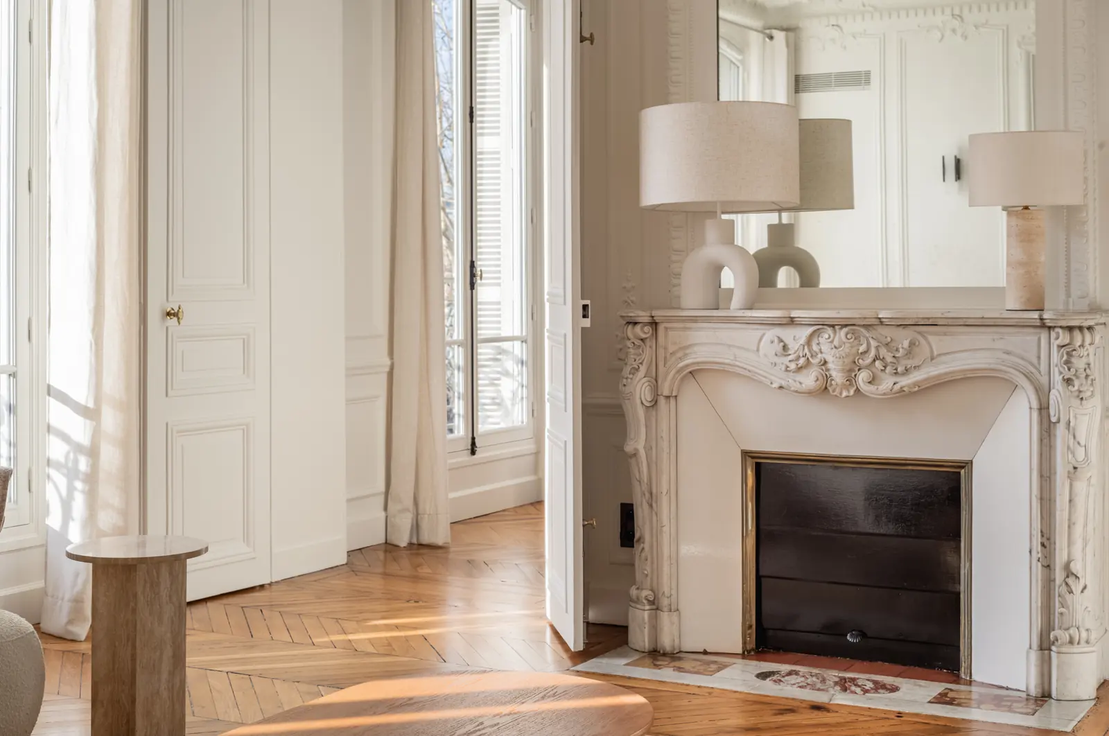 Carved marble fireplace and parquet floor