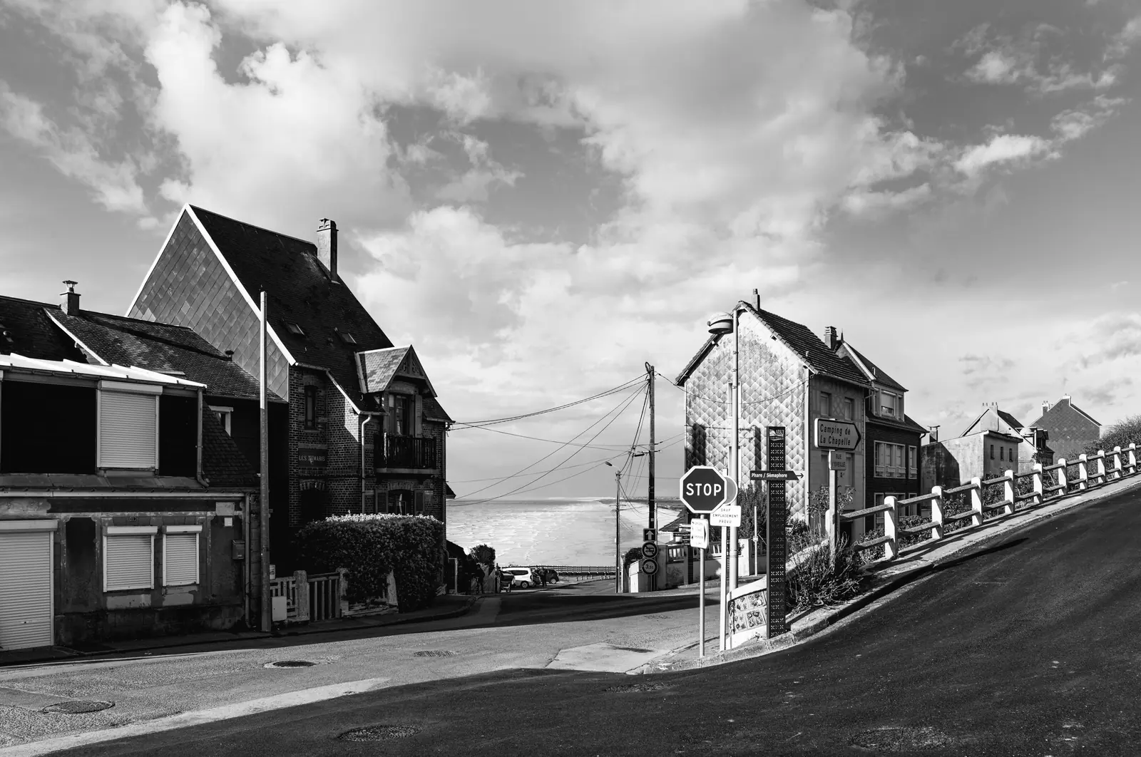 Seaside villas on a slope with the sea at the end of the street