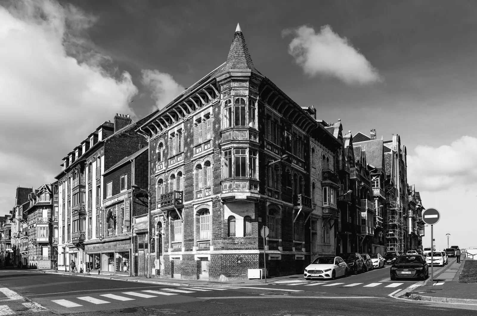 Corner building with turrets on an empty crossroads