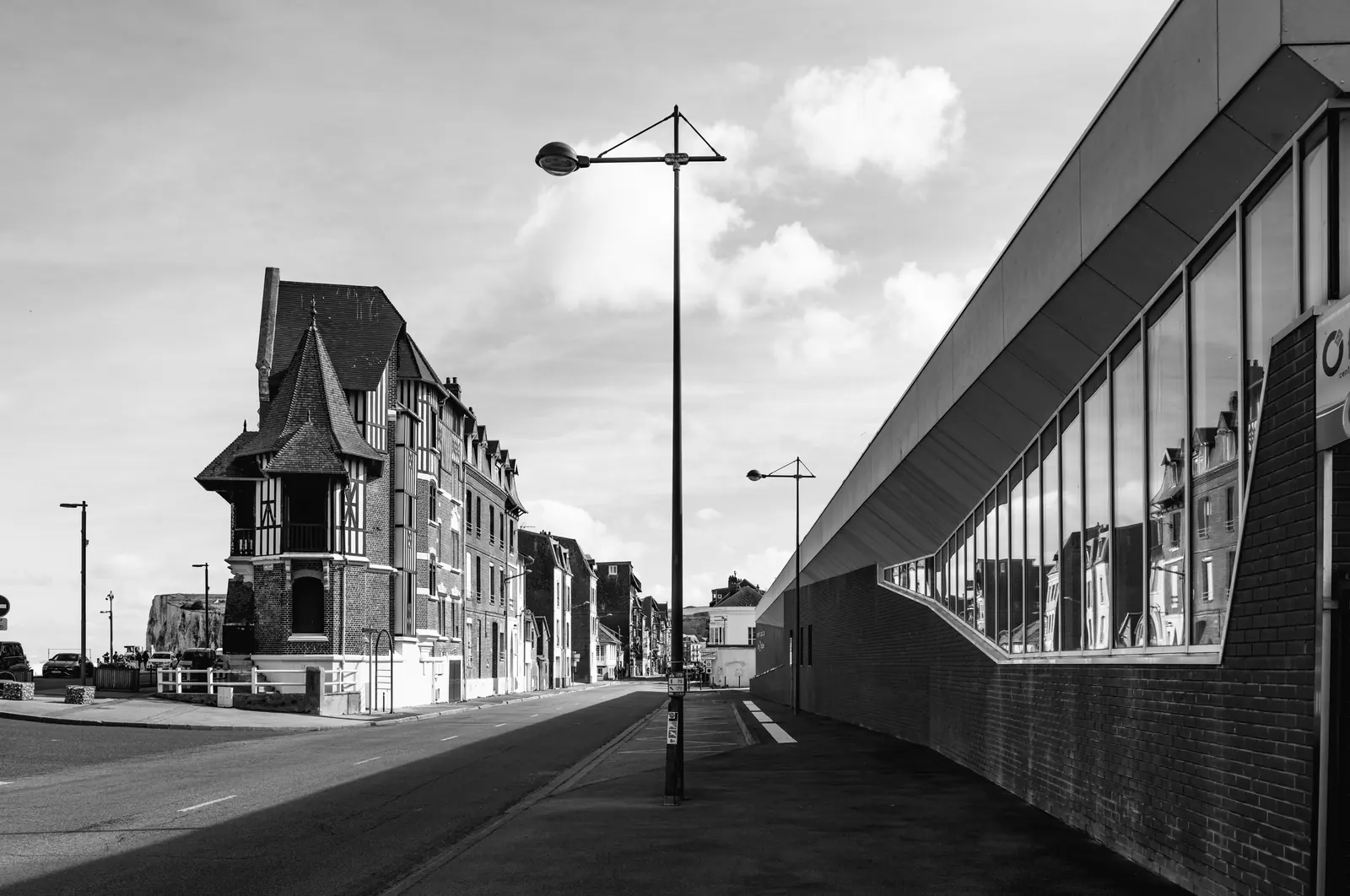 Street lamp, a villa and the edge of a modern building